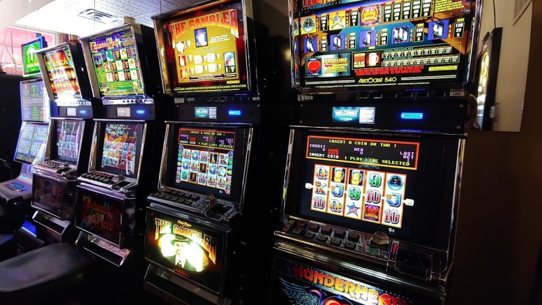 How does video poker differ from slot machines in terms of strategy?